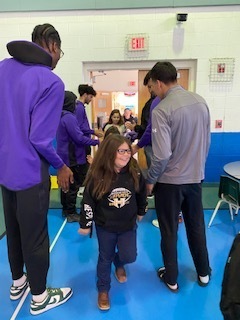 NMHU Basketball Players Greeting DC  Students 